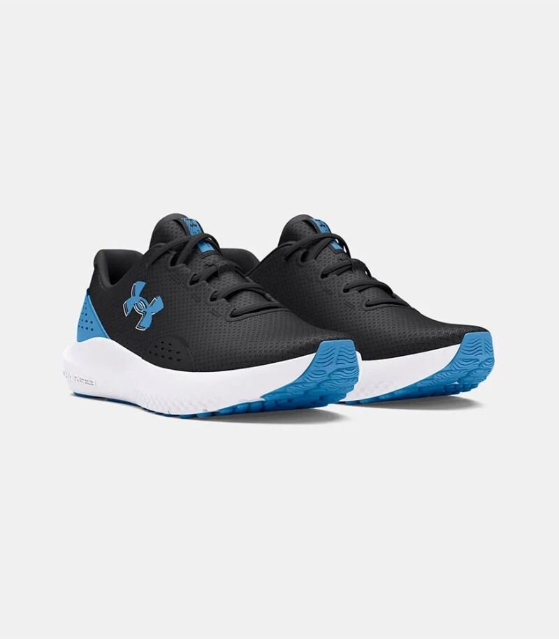 Under armour running shoes in black with white soles and blue detailing 